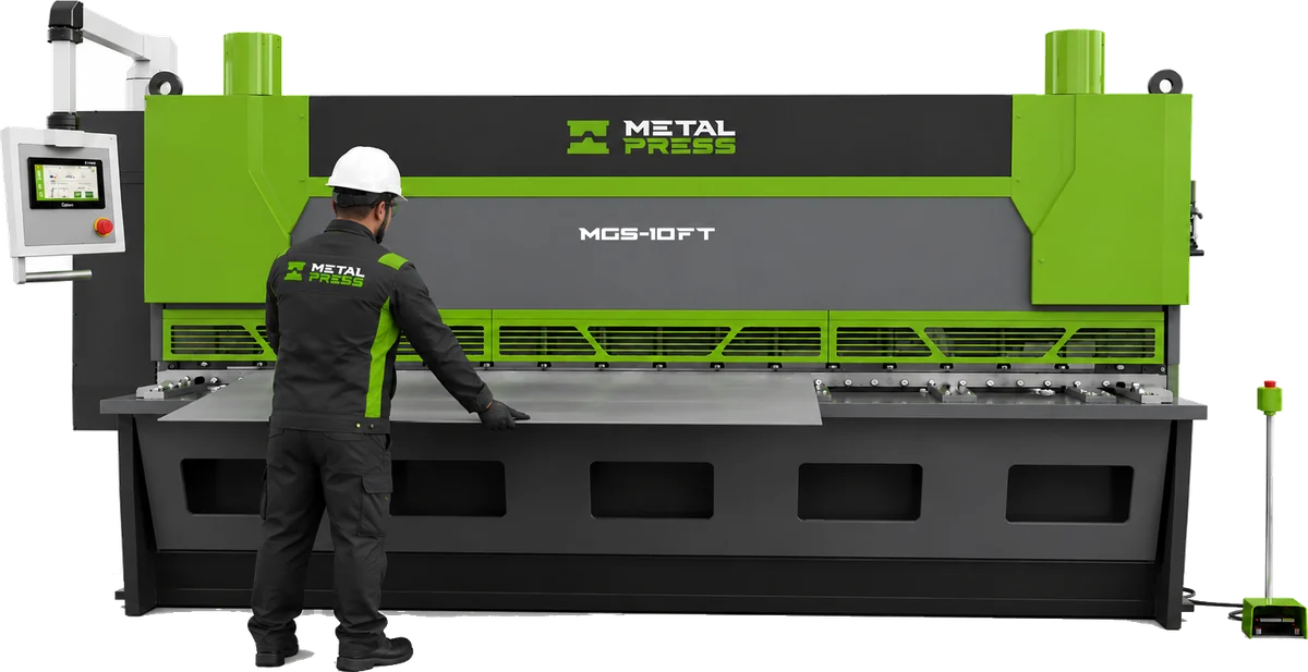 Operator positioning sheet metal at a MetalPress Titan Class MGS guillotine shear